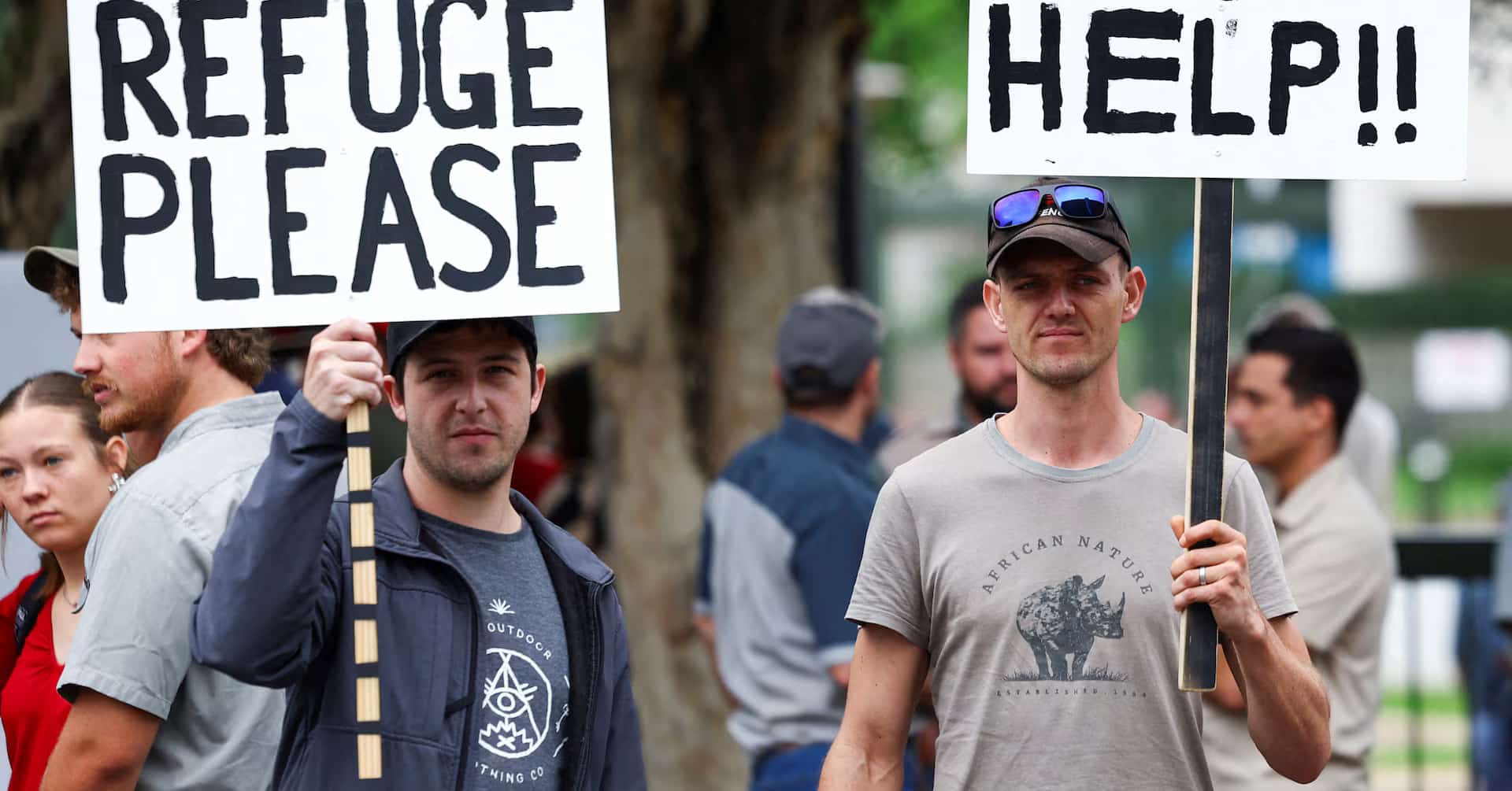 First white South Africans board plane for US under Trump refugee plan